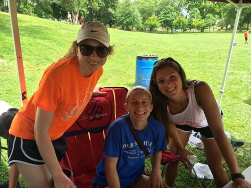 Corinne Maue (left), Lauren Ryan, and Ria Rebein, Class of 2016 graduates, are outgoing Key Club officers who helped start the Ultimate Frisbee Tournament in memory of Jenny Deery in 2015.