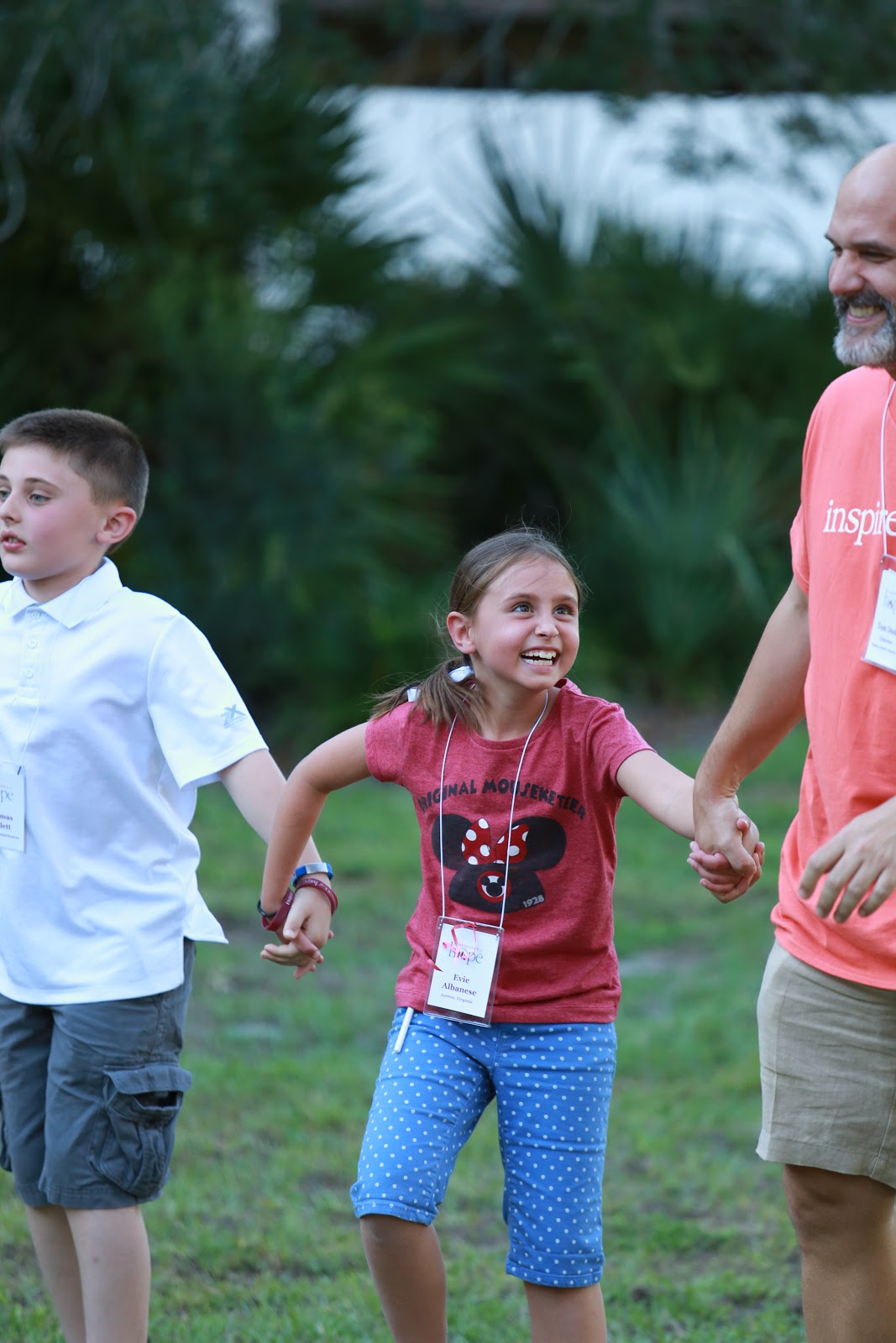 Tom creating a precious memory for another child at a retreat in Orlando, Florida