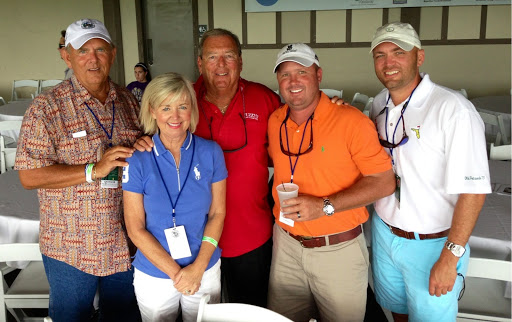 Fuzzy (center) with the Lewis brothers at a golf outing