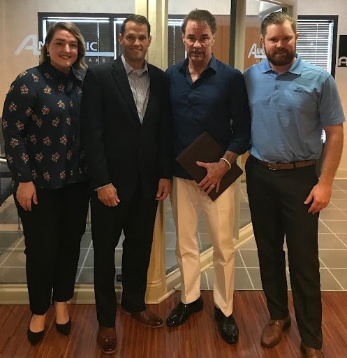 Mark and Roy Edgerton (r-l) with IoH CEO Deric Milligan and Strategic Initiatives Director Audra Milligan