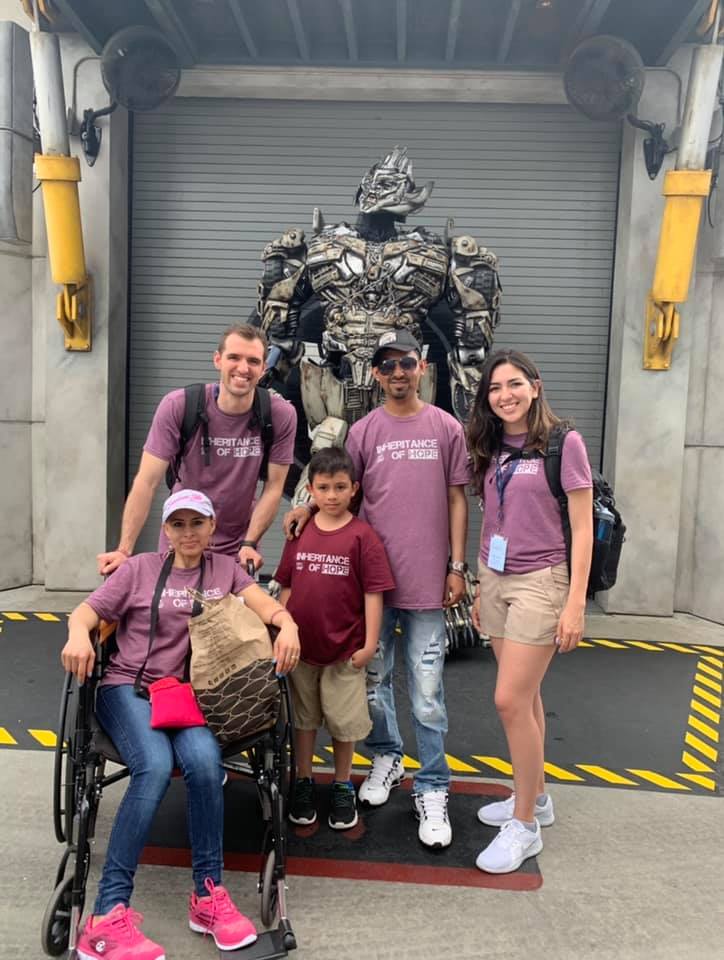 Ally (right) serving the Rivera family at Universal Studios