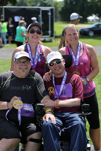 Finishers! Maria Lorzel, Heather Dodd, Blake Austin, and Chris celebrate   after  the 2017 Minnesota Nut House Challenge Half Marathon