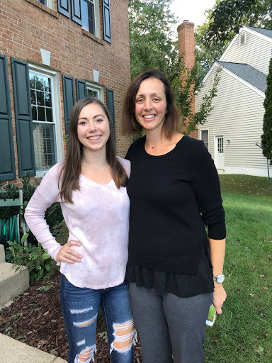 Andrea models her new necklace with Jackie