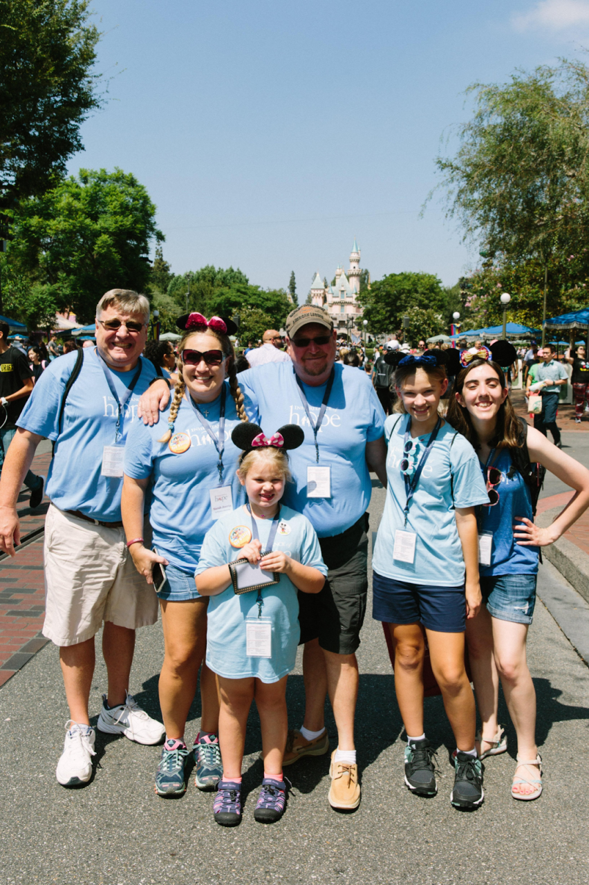 Anna, far right, is all smiles while serving the Joerin family.