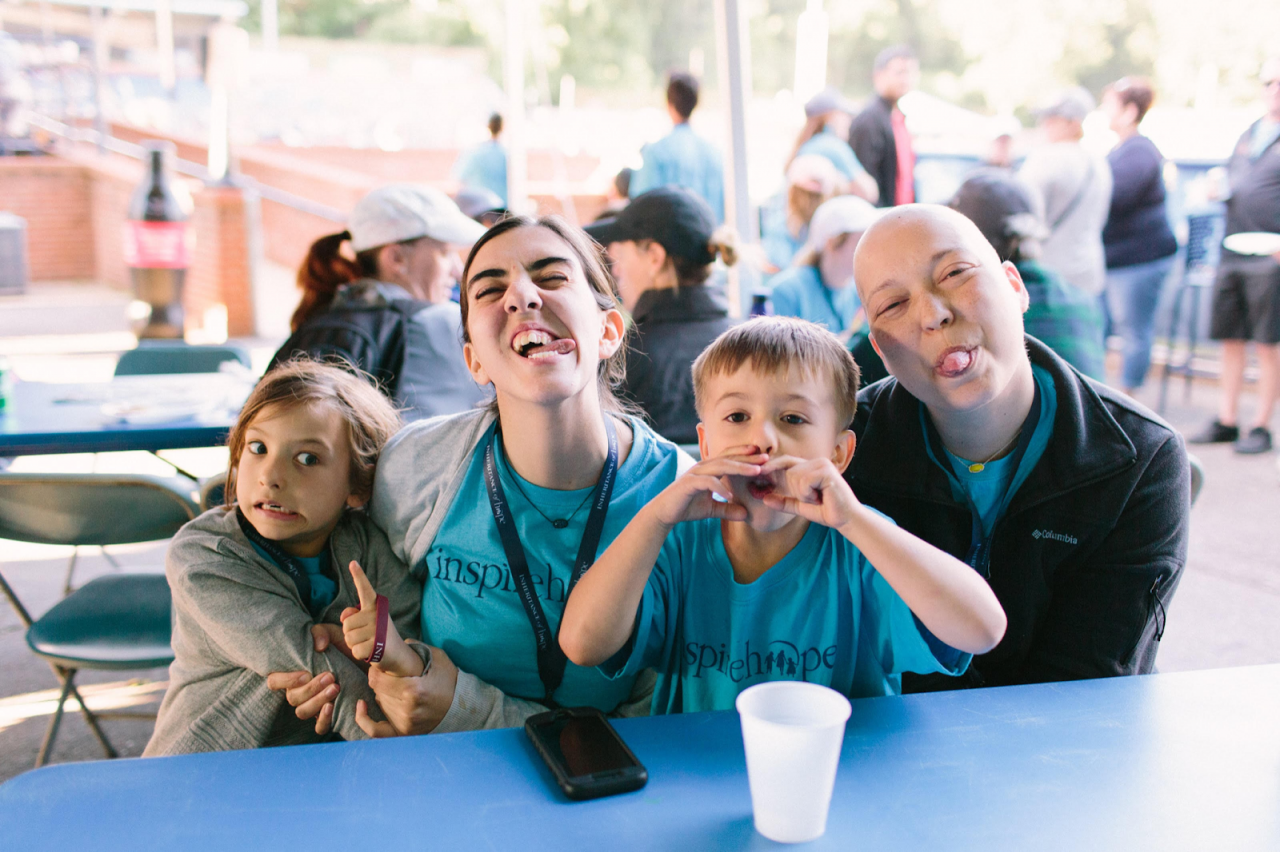 Funny faces = fun times! Cutting up with the Cochran family at a baseball game.