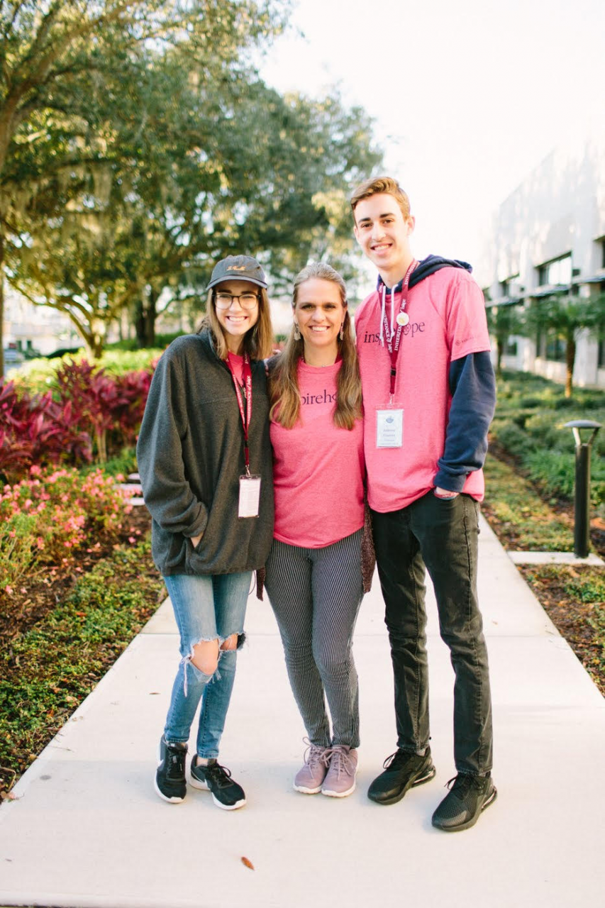 All in the family: Kaleigh (left) serving alongside her mom Judy and brother Ashton. Kaleigh’s dad BJ (not pictured) is also an IoH volunteer and supporter! 