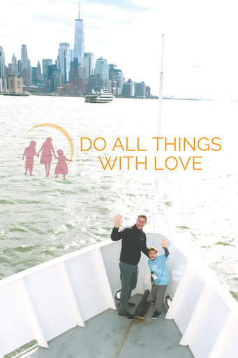A man and young boy smiling and waving from the front of a boat with the message, "Do all things with love" superimposed below the city skyline in the distance