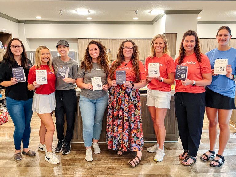 Group photo of Inheritance if Hope volunteers at a "Cooking up Hope" event.