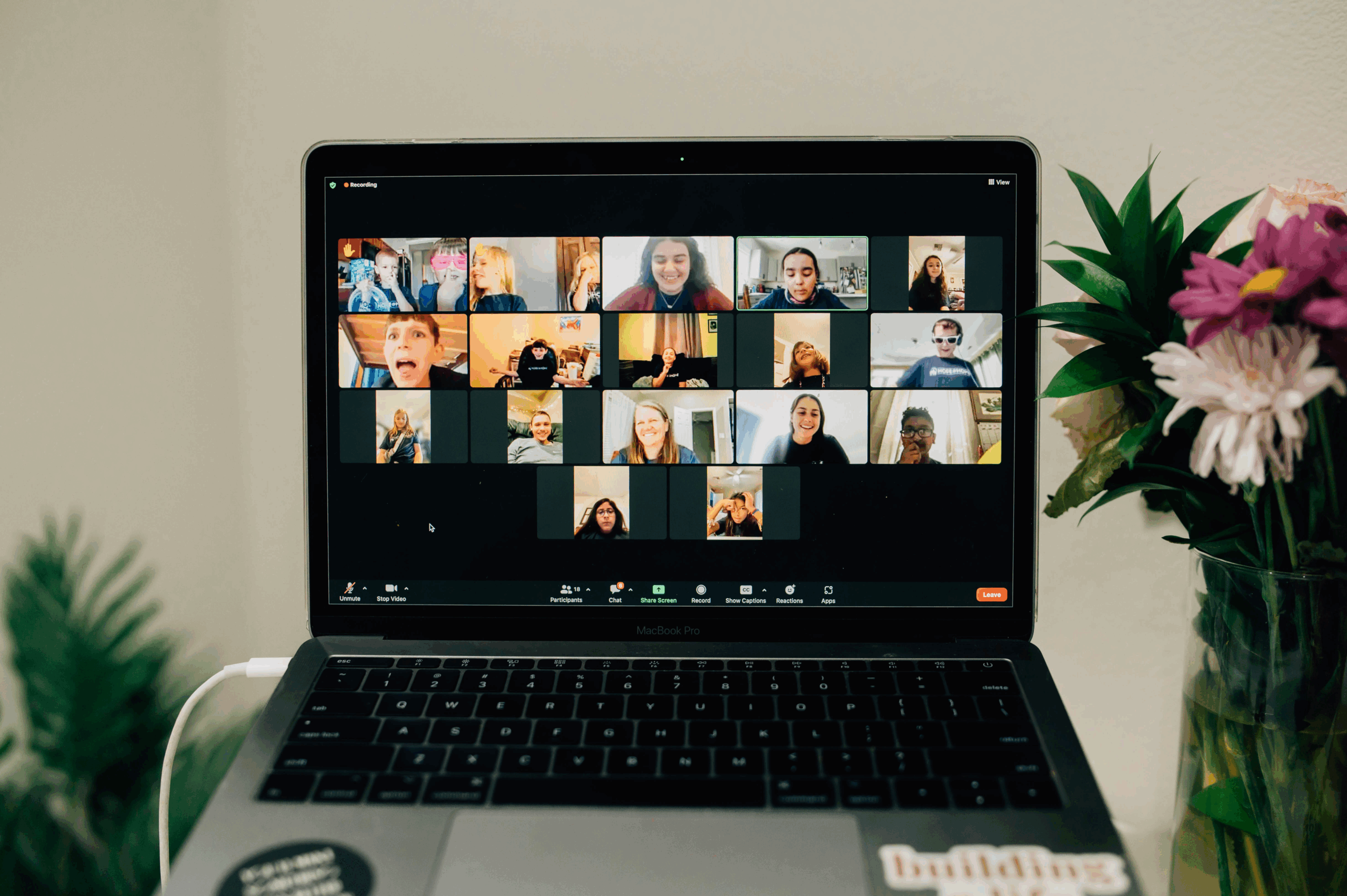 A computer with a virtual support group taking place on screen.