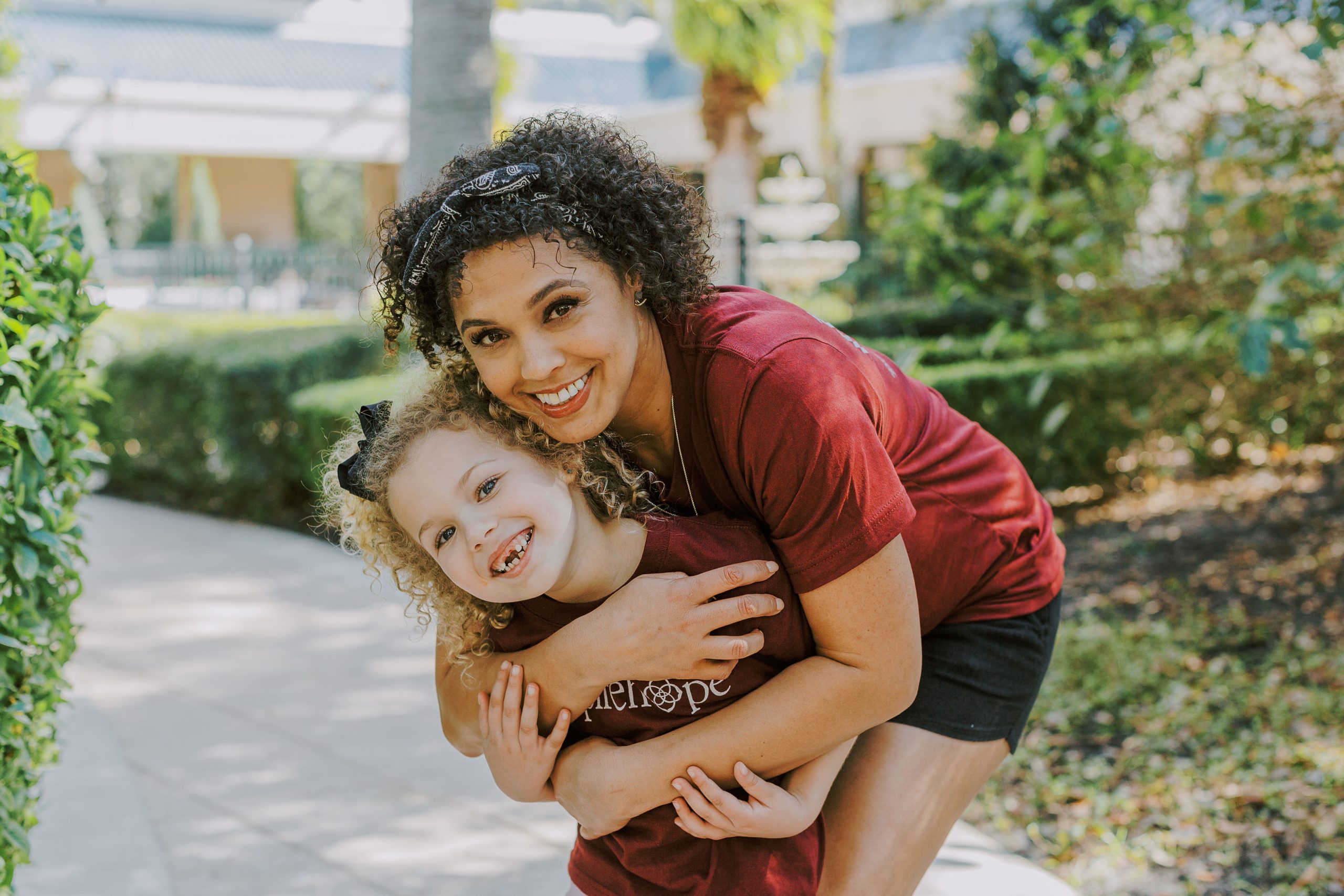 Photo of a mom and daughter hugging