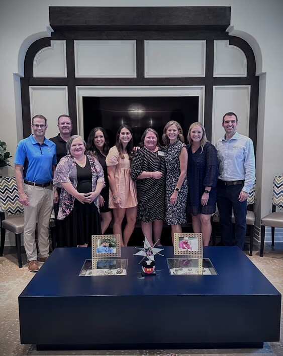 IMG_3582 (1) A group of Inheritance of Hope partner representatives smiling for a group photo