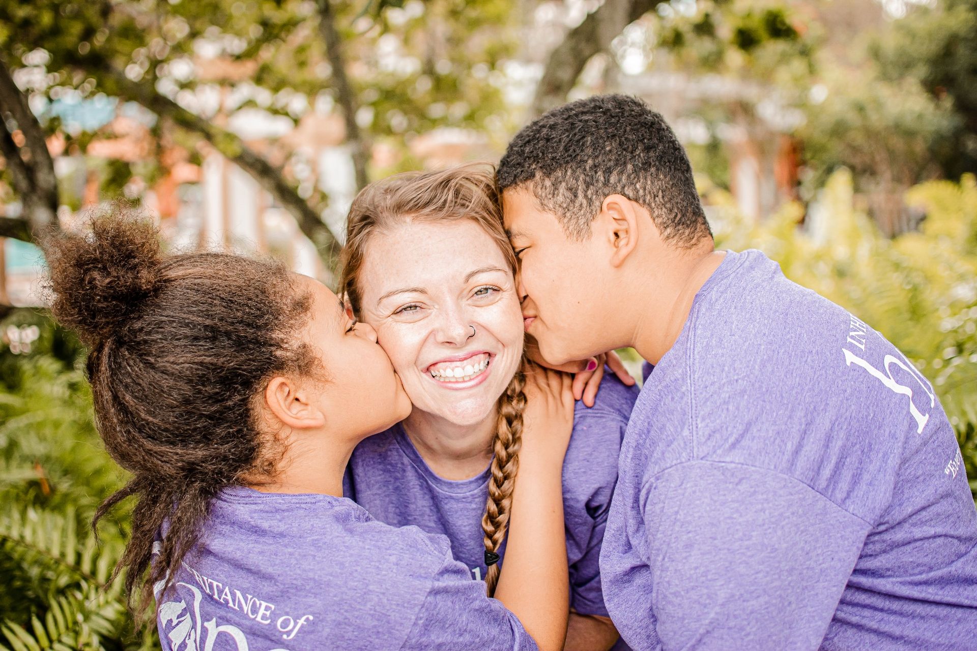 image2 Family wearing matching blue shirts.