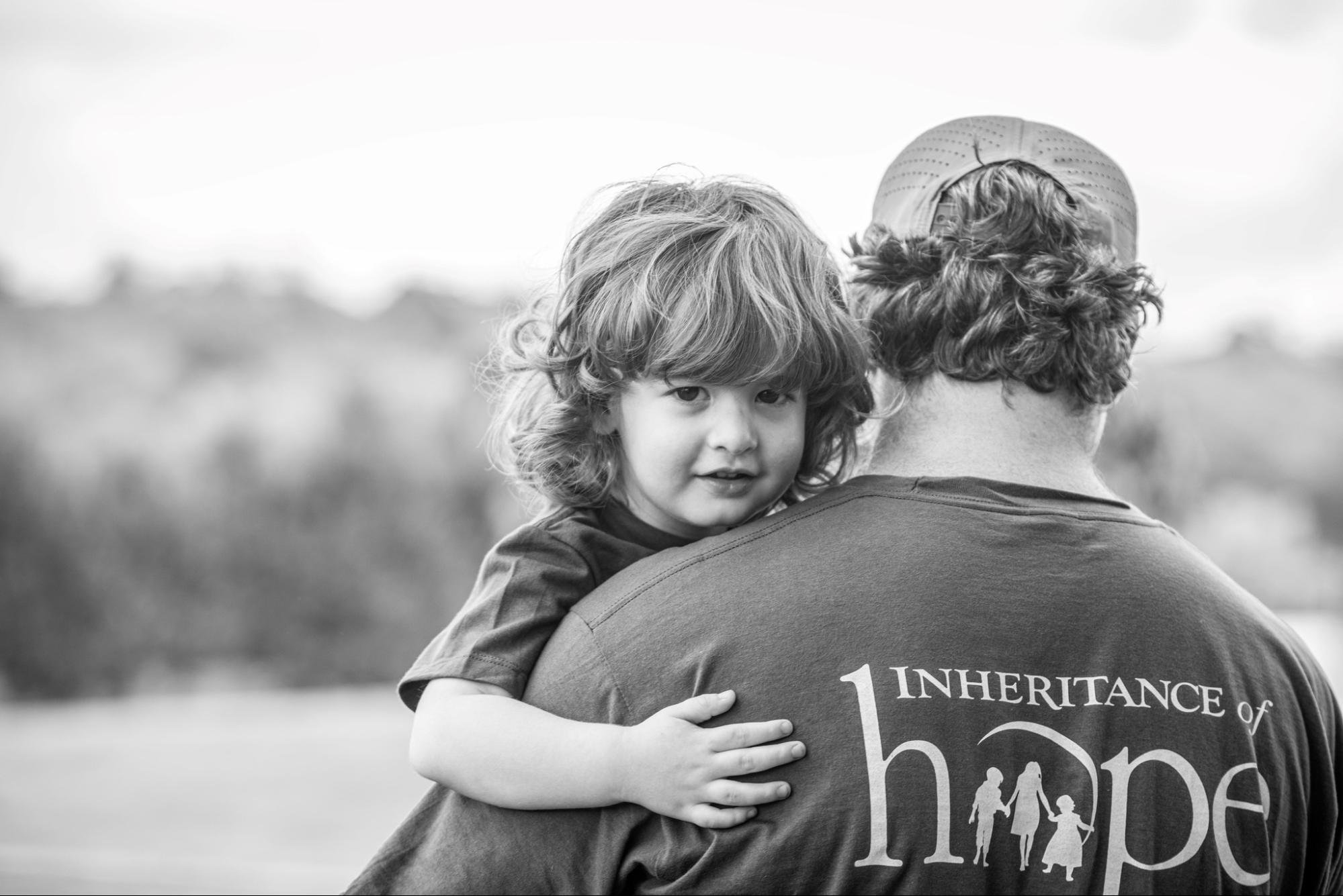 Family wearing matching blue shirts.