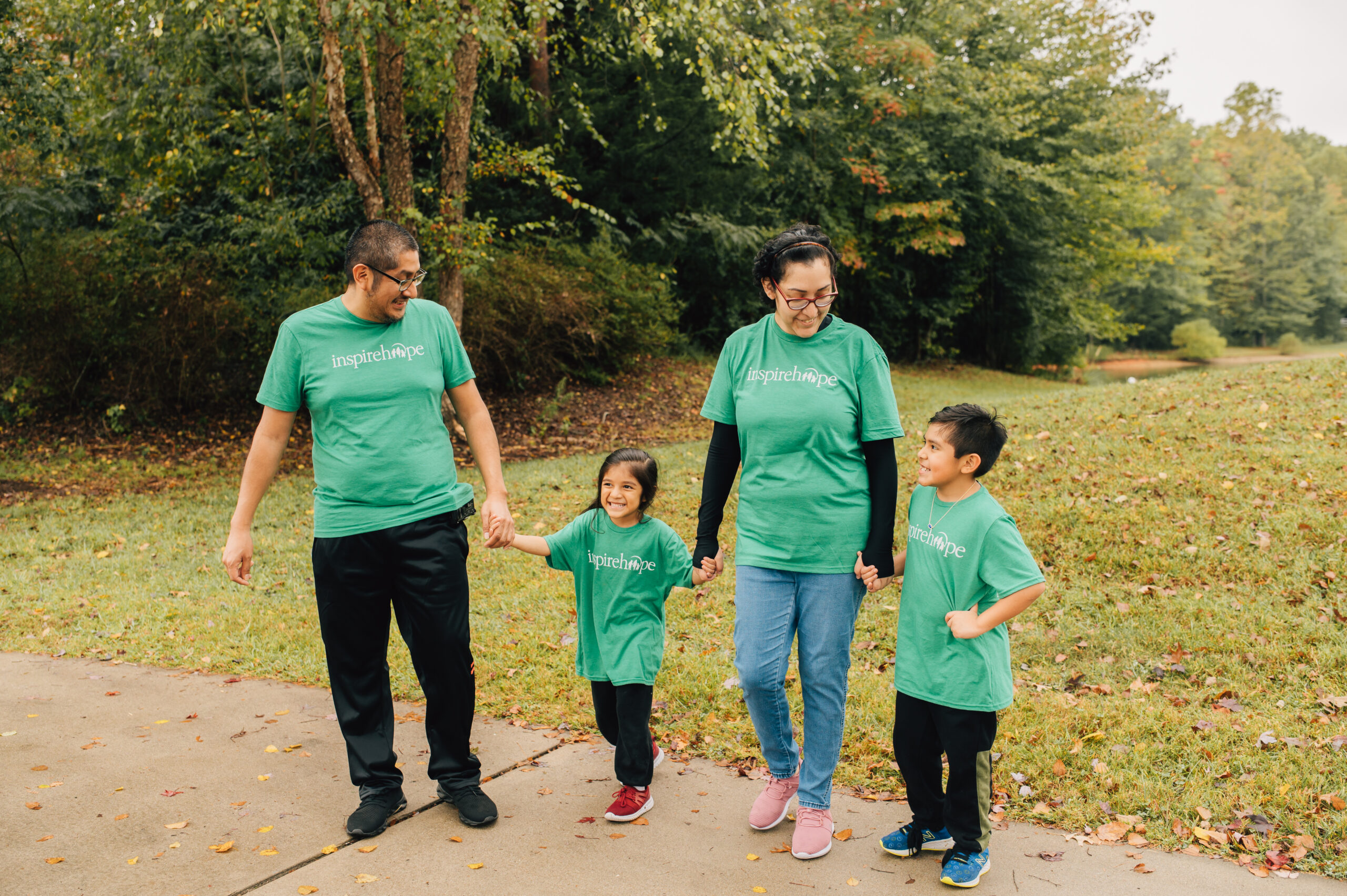 Woman with ALS being hugged by her child