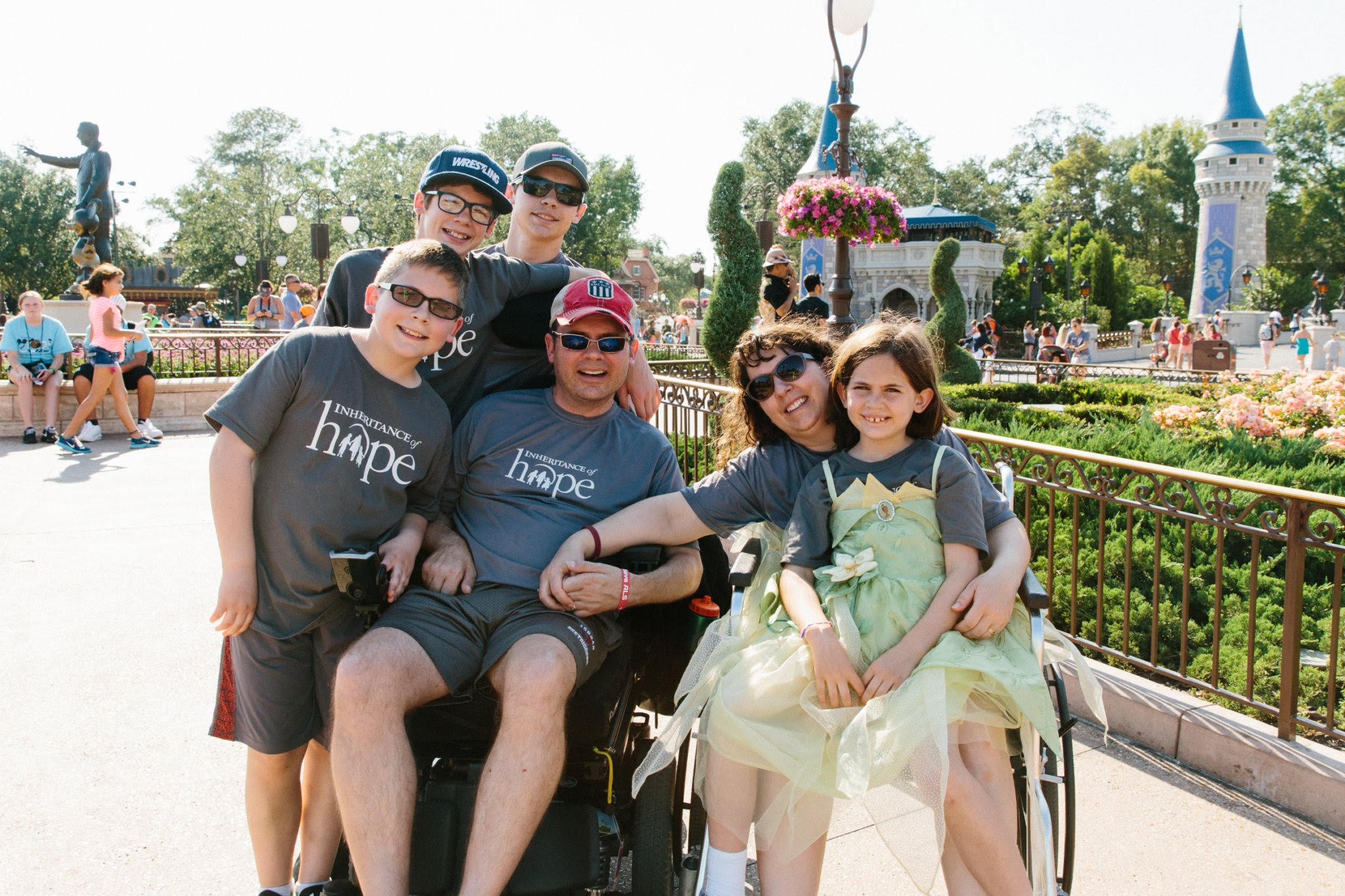 A family enjoying a theme park.